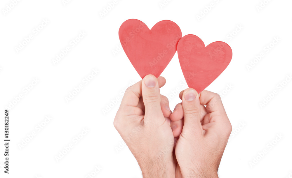 Hand holding wood heart Hand holding wood heart