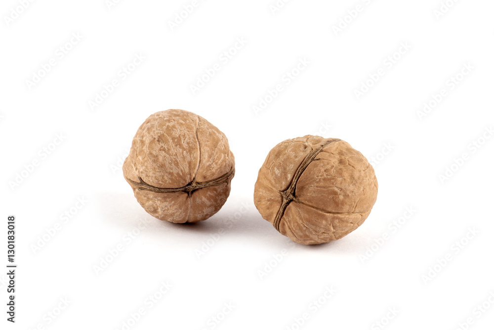 Walnuts in shell isolated on white background Walnuts in shell isolated on white background