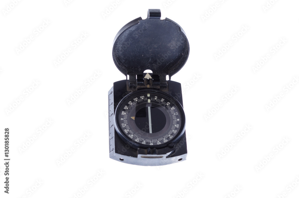 Manual compass for land navigation on a white background close-up Manual compass for land navigation on a white background close-up