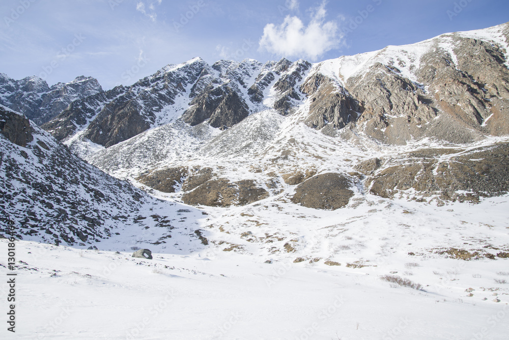 The majestic mountain peaks of the Eastern Sayan mountains.