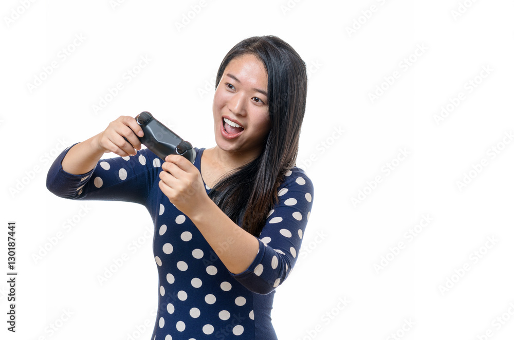 Young woman steering with game controller Young woman steering with game controller