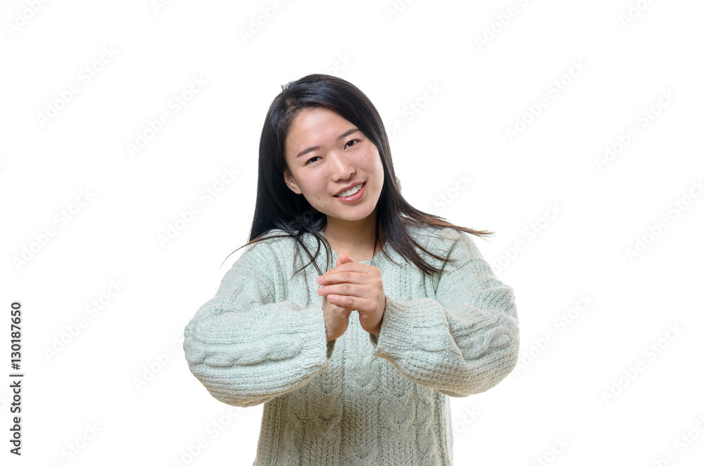 Smiling young woman offering New Year greetings Smiling young woman offering New Year greetings