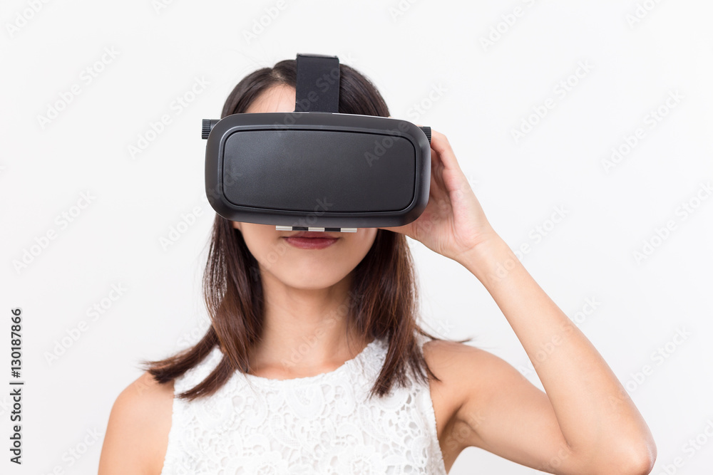 Young girl lookinh with VR device Young girl lookinh with VR device