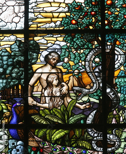Stained glass of Adam and Eve in the Garden of Eden, Vienna, Austria