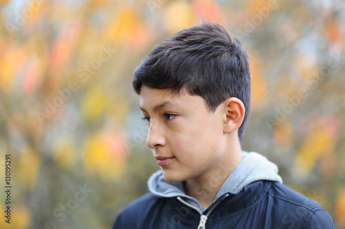 Young teen boy in the park