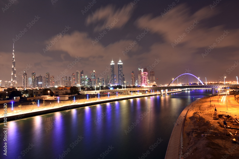 Fototapeta premium Dubai Skyline at night from new Dubai Canal, U.A.E