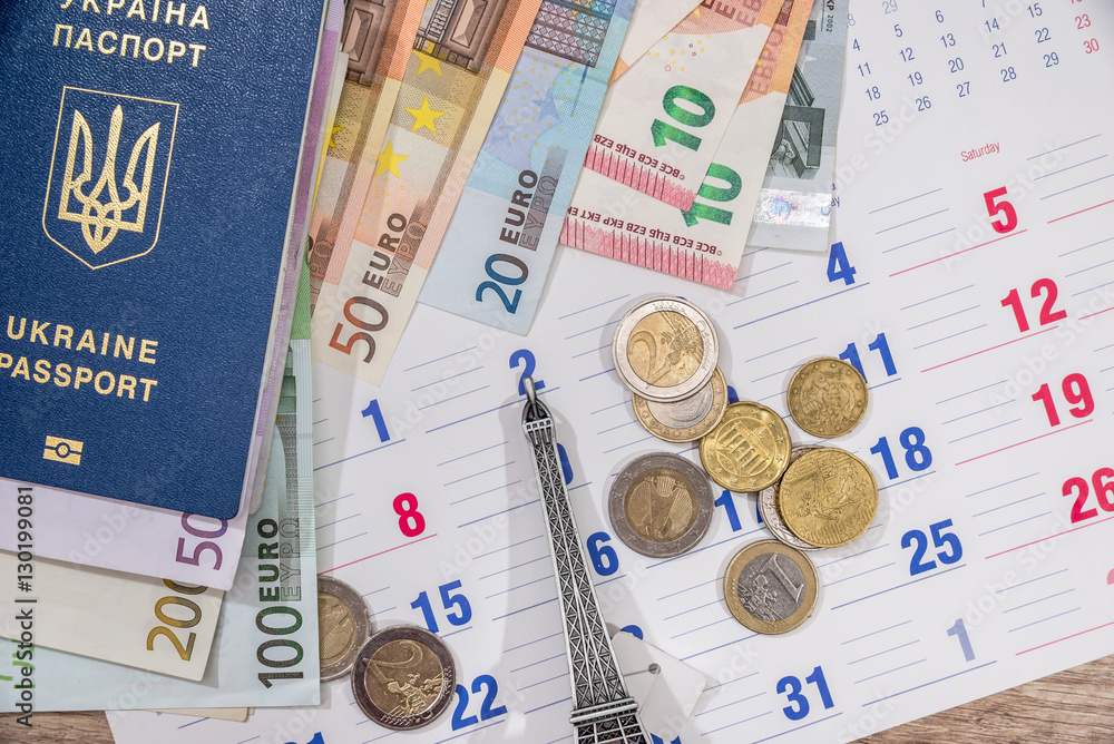 calendar, euro bills and coin with passport. travel concept. calendar, euro bills and coin with passport. travel concept.