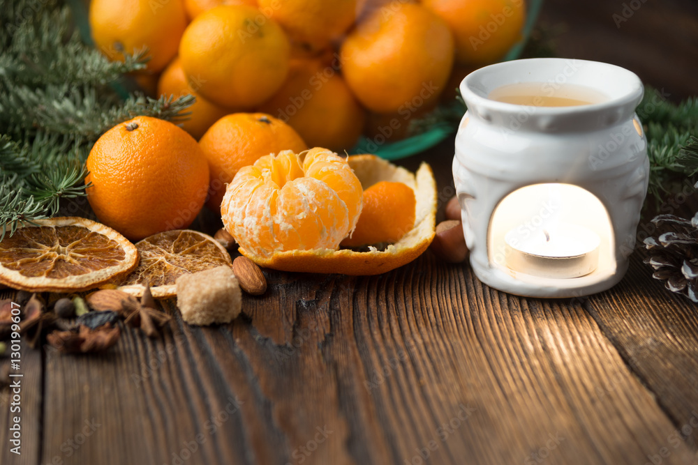 Tangerines and decorations for the holiday table Tangerines and decorations for the holiday table
