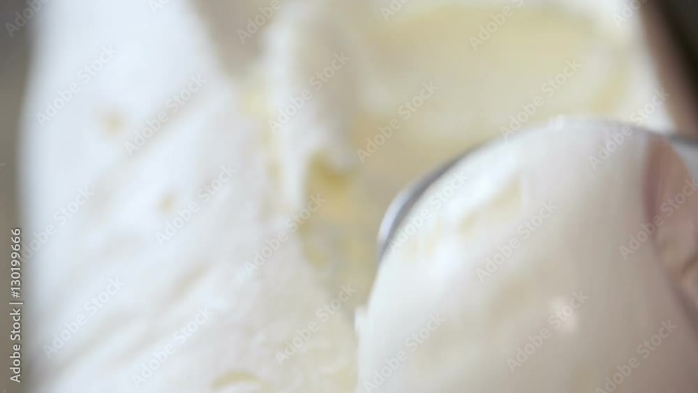 scooping vanilla ice cream ball scooping vanilla ice cream ball