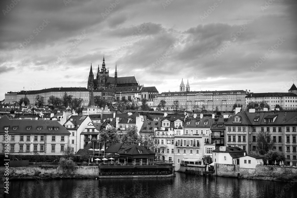 Colorful morning view of Charles Bridge, Prague Castle and St. Vitus cathedral on Vltava river. Sunny spring scene in Prague. Czech Republic - Prague old town view