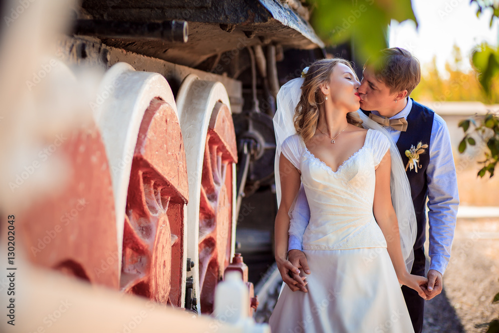 image of bride and groom at the station