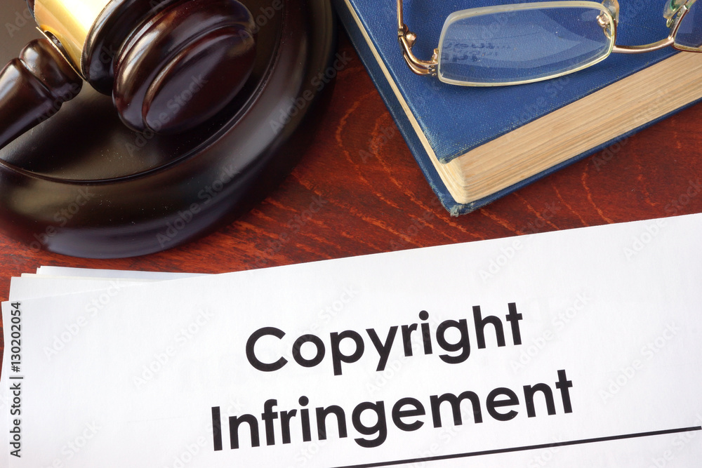 Fotografie Copyright infringement form on an office table.