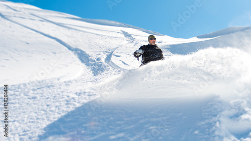 snowboard en poudreuse