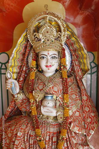 Statue of the Hindu goddess Annapurna (Parvati) giving food, Lakshman temple, Rishikesh, Uttarakhand
