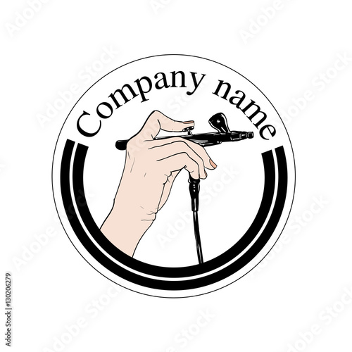 Hand holding a professional airbrush. can be used as logo.
