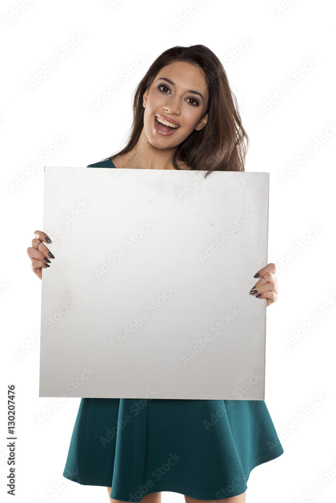 advertising young woman in a short turquoise dress holding empty banner advertising young woman in a short turquoise dress holding empty banner