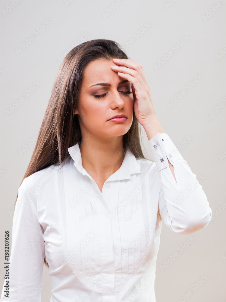 Portrait of young businesswoman who is having headache. Portrait of young businesswoman who is having headache.