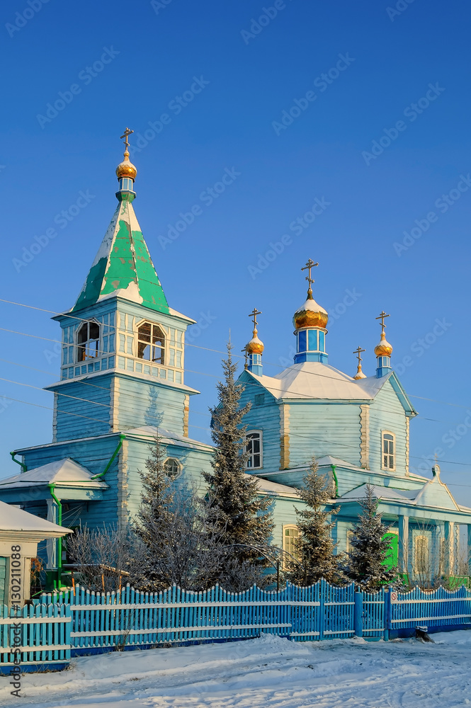 Chimeevo, Russia - December 1, 2007: Wooden church of Our Lady of Kazan in Sacred and Kazan men's Chimeevsky monastery. Kurgan region