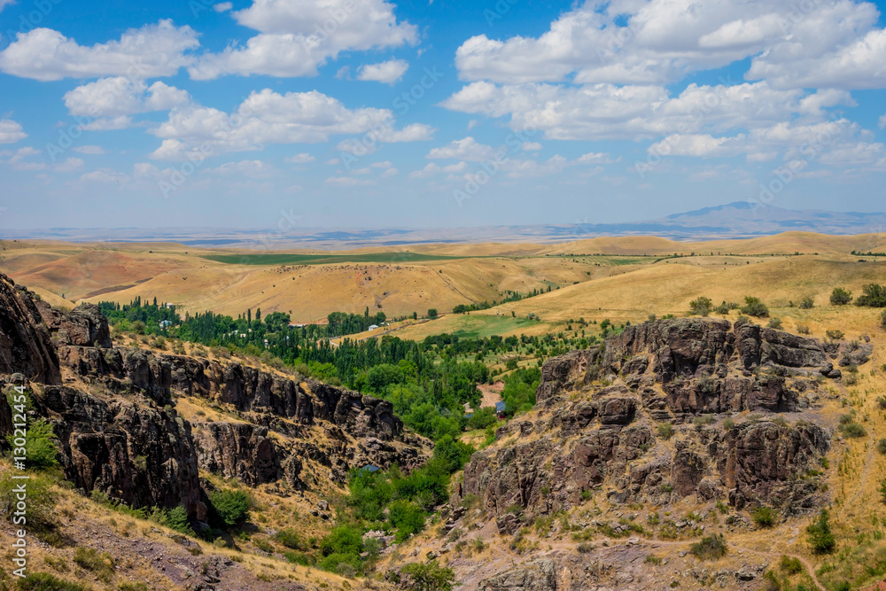 Turbat canyon and grasslands behind, Kazakhstan