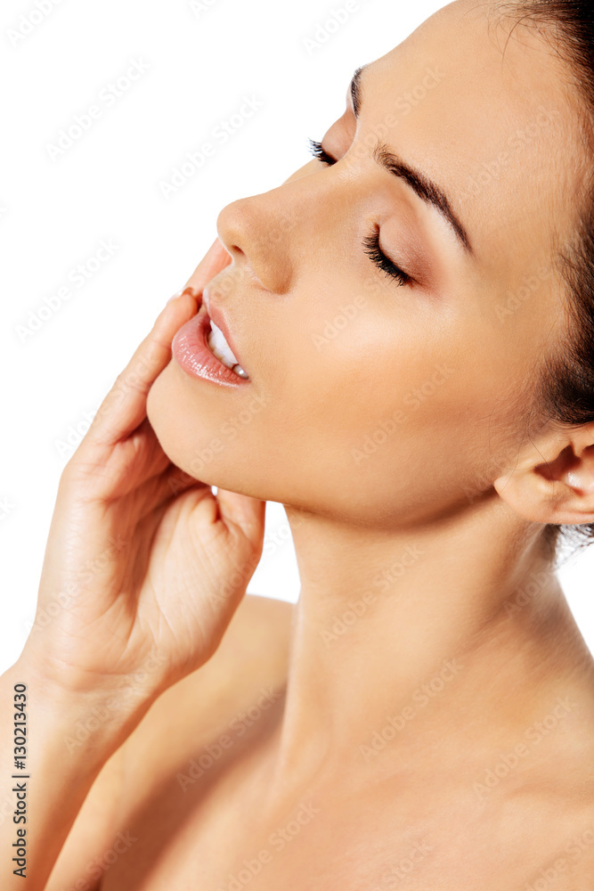 Beautiful face of young woman with clean fresh skin. Beautiful face of young woman with clean fresh skin.