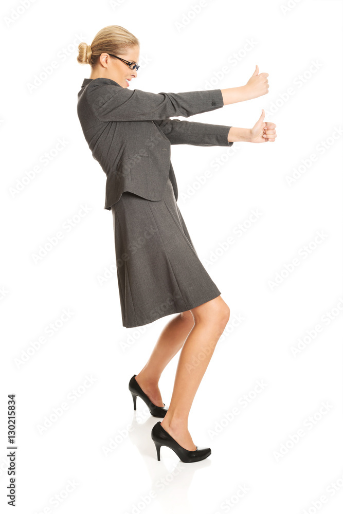 Businesswoman pulling a stick Businesswoman pulling a stick