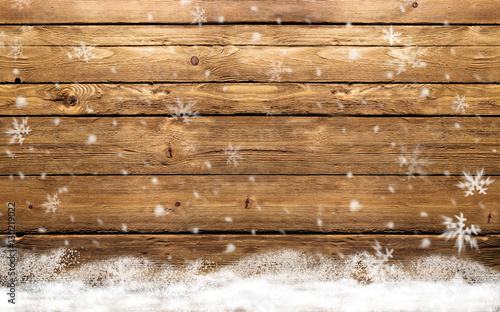 wooden background with snowflakes