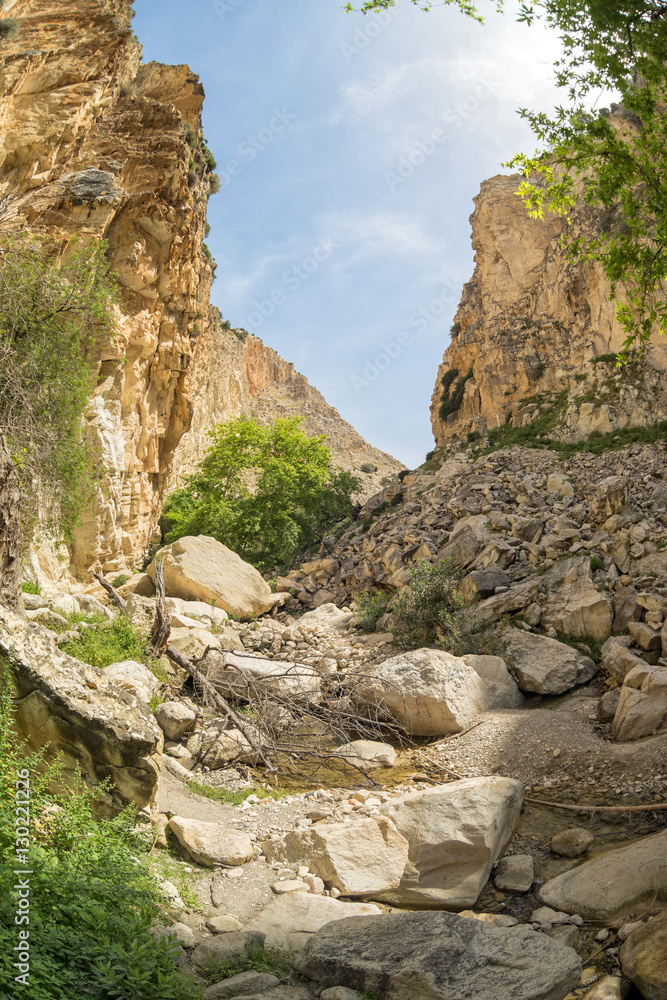 Fisheye view on Avakas Gorge with steep rocks and river on bottom. Akamas peninsula, Cyprus.
