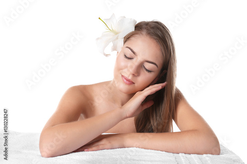 Beautiful young woman lying...