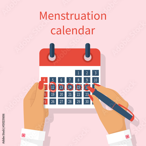 Woman notes in the calendar menstrual cycle
