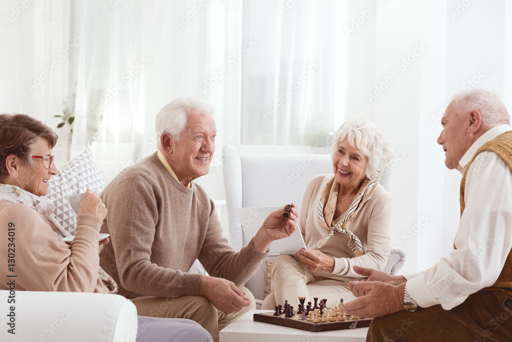 Seniors playing chess Seniors playing chess