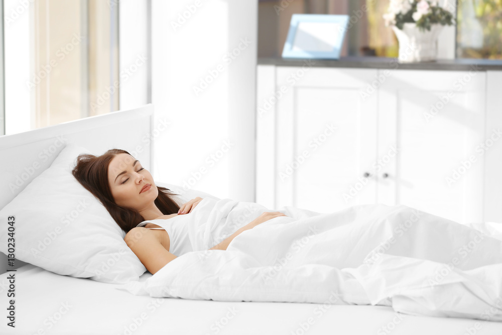Young attractive woman sleeping in bedroom Young attractive woman sleeping in bedroom