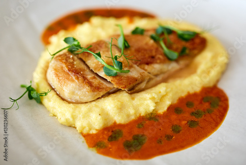 Chicken breast with mashed potatoes and sauce