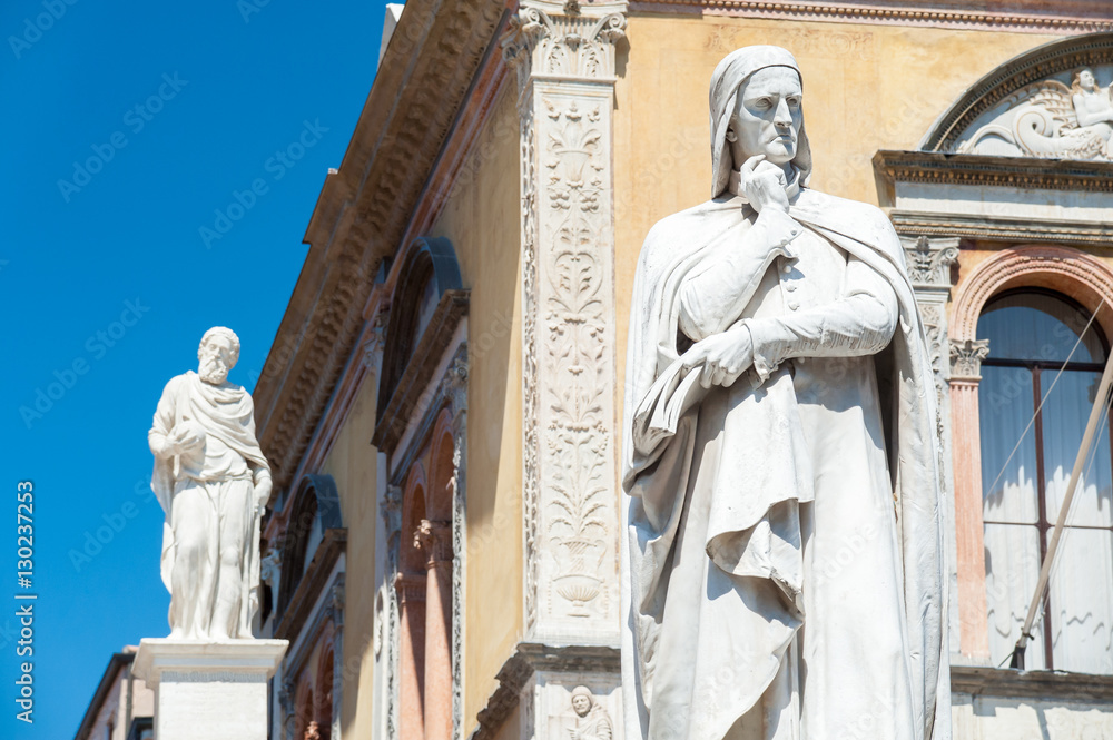 Fototapeta premium Landmarks of Verona: the statue of the famous italian poet Dante alighieri in Lords Square