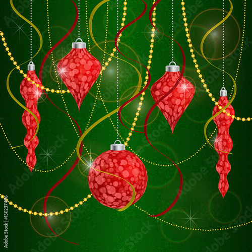 Red Christmas tree decorations on a green background