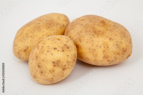 close up of three potatoes