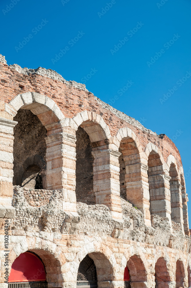 Landmarks of Verona: partial view of the famous amphitheater Arena Landmarks of Verona: partial view of the famous amphitheater Arena