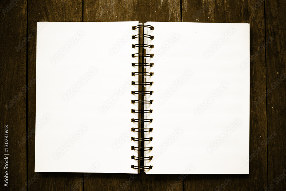Business organizer notebook on wooden table