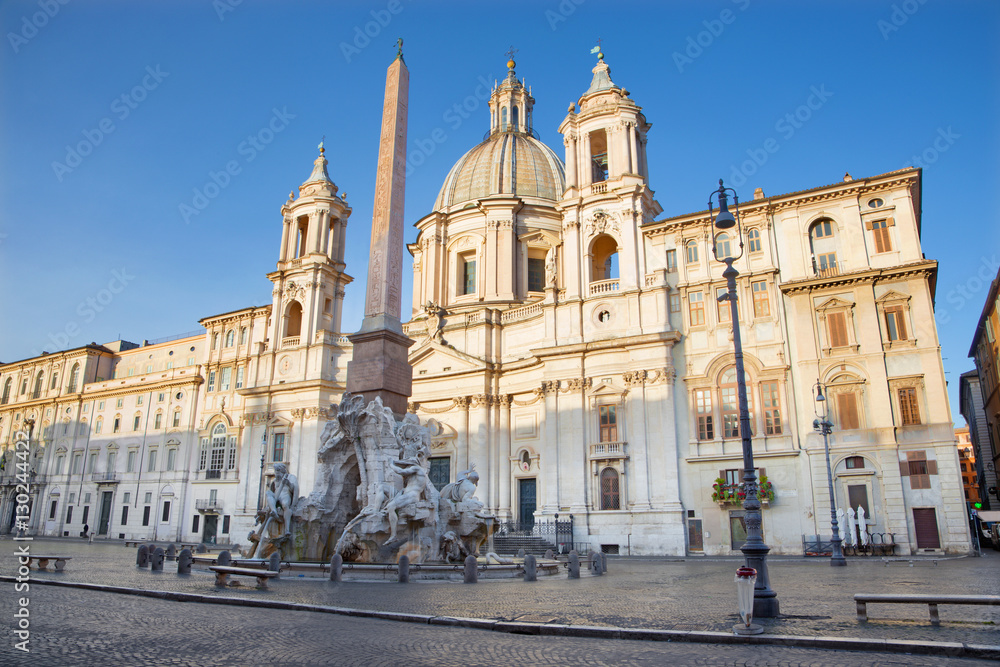 Rome - Piazza Navona in morning and Fontana dei Fiumi by Bernini and Egypts obelisk and Santa Agnese in Agone church