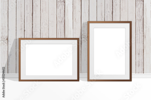 Two blank photo frames near old painted wooden panels wall, countryside style decor, interior mock up