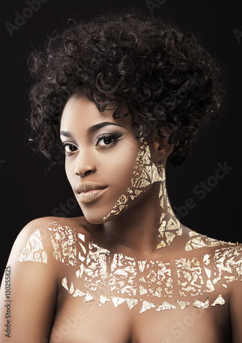 Afro-American woman in gold