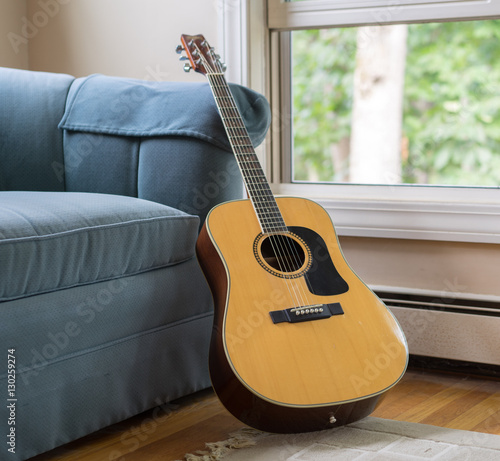 Guitar Leaning on Couch