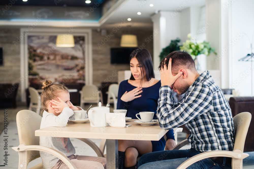 Little girl doesn't want to hear arguing of parents Little girl doesn't want to hear arguing of parents