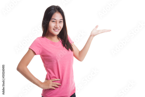 Young Asian woman present with her hand..