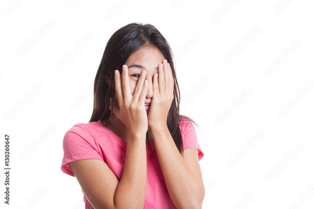 Beautiful young Asian woman peeking through fingers.. Beautiful young Asian woman peeking through fingers..