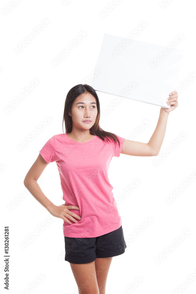 Young Asian woman with white blank sign. Young Asian woman with white blank sign.