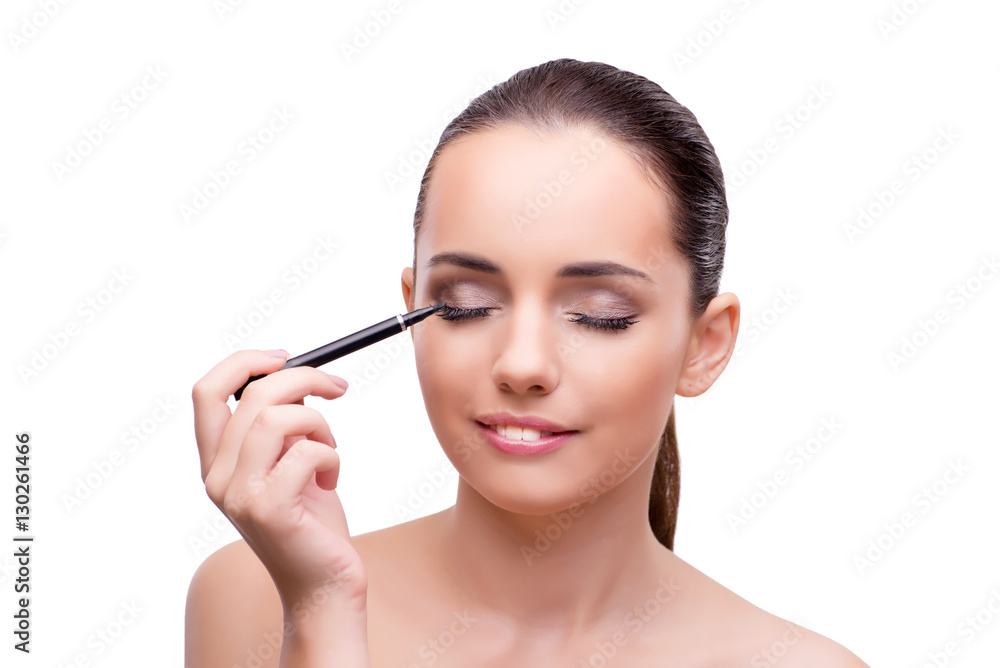 Woman getting make-up isolated on white