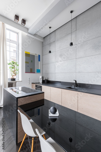 Kitchen with black countertops