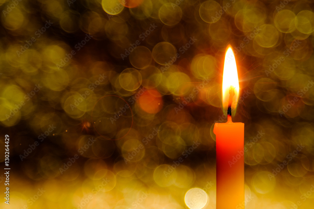 lighting flare effect on Candle flame light at night with abstract circular bokeh background Christmas lights. lighting flare effect on Candle flame light at night with abstract circular bokeh background Christmas lights.