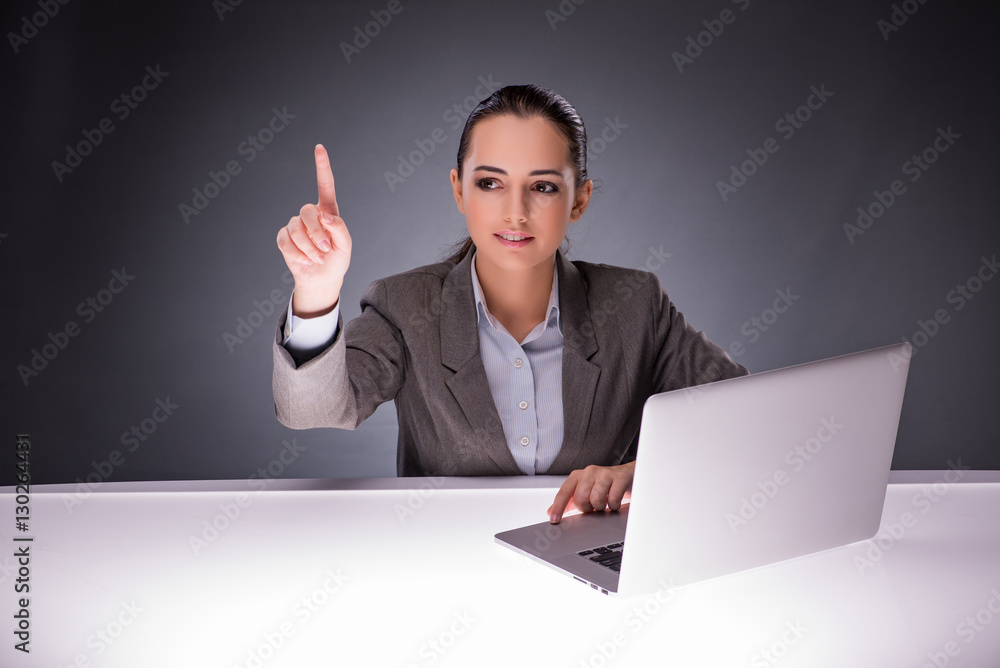 Businesswoman with laptop in business concept Businesswoman with laptop in business concept