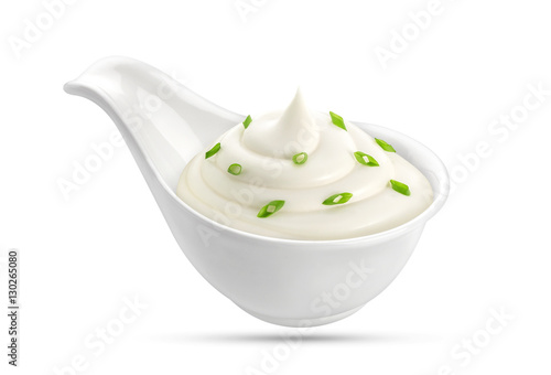 Bowl of sour cream and onion isolated on white